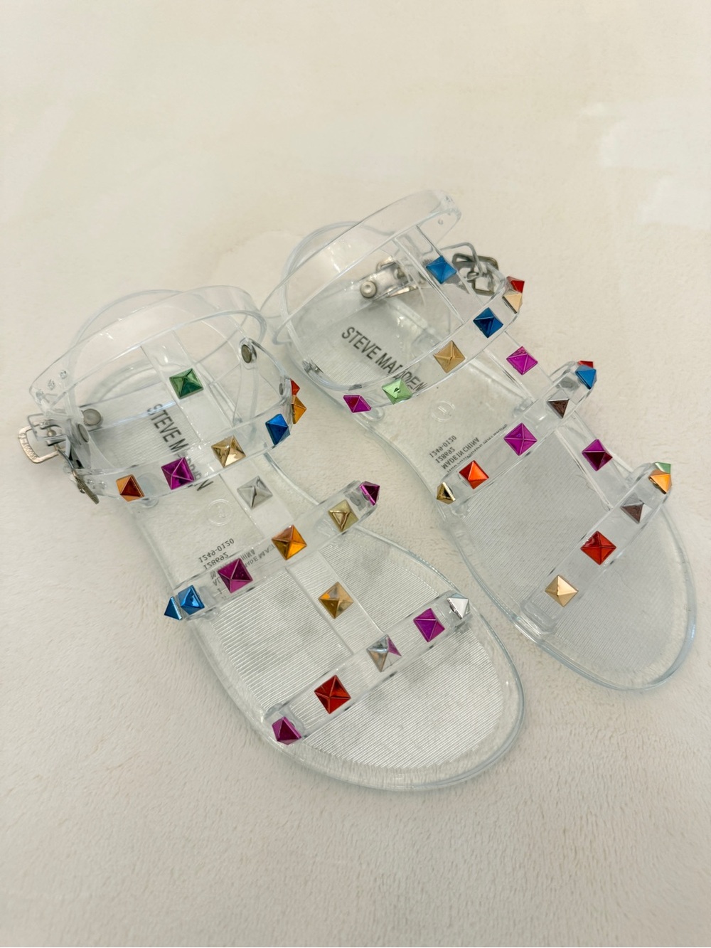Steve Madden Clear Jelly Sandals with Multicolor Pyramid Studs